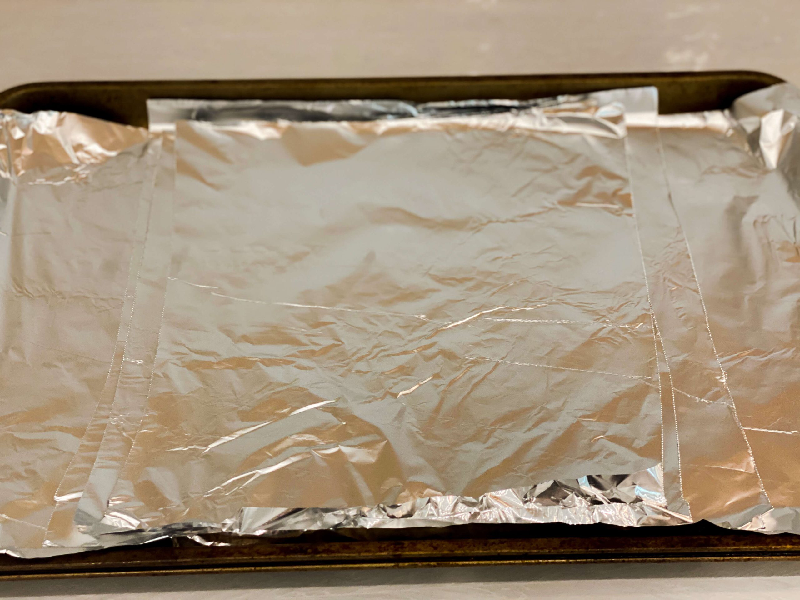 baking sheet lined with aluminum foil big enough to fit the apple Tarte Tatin