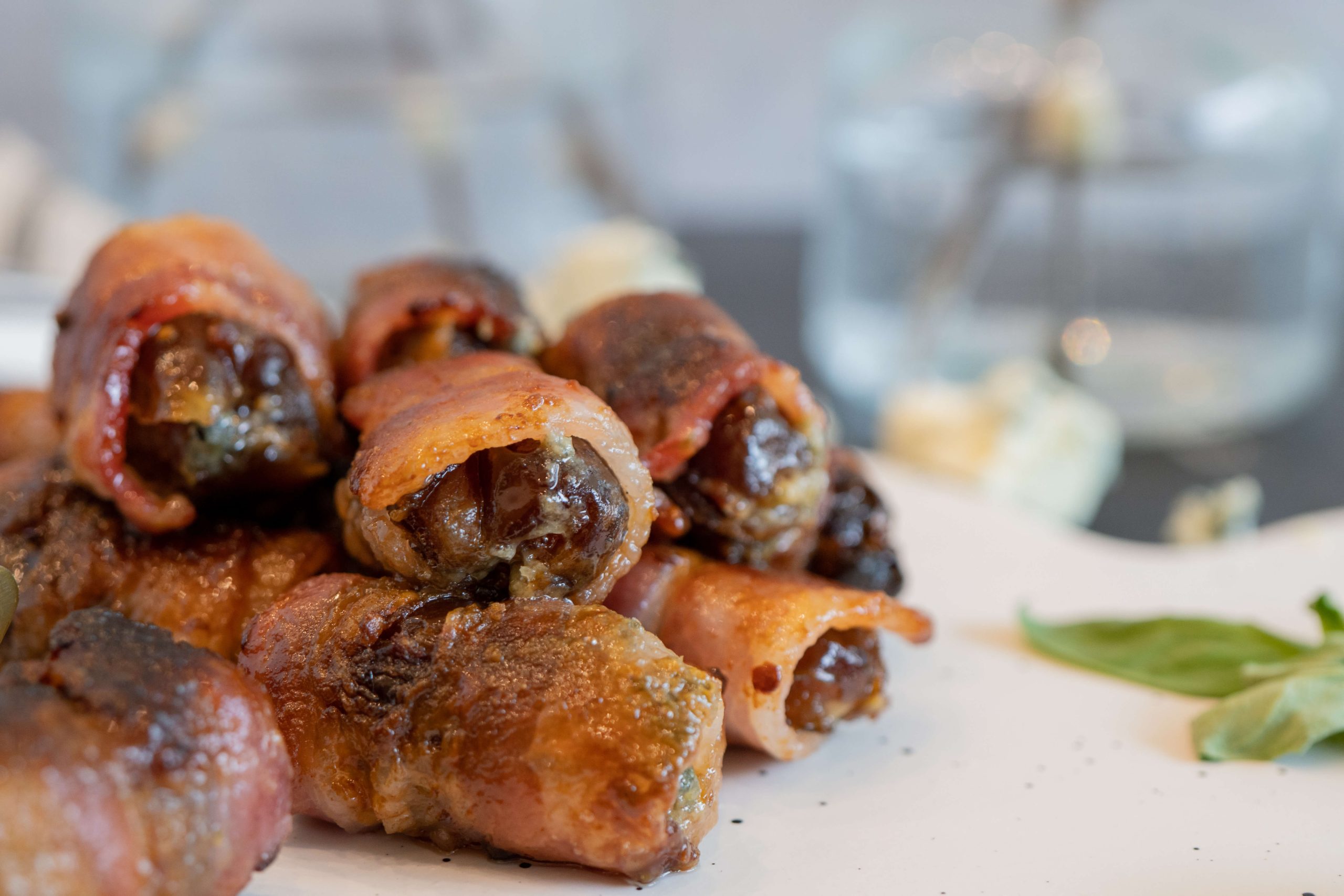 Crispy bacon wrapped dates close up