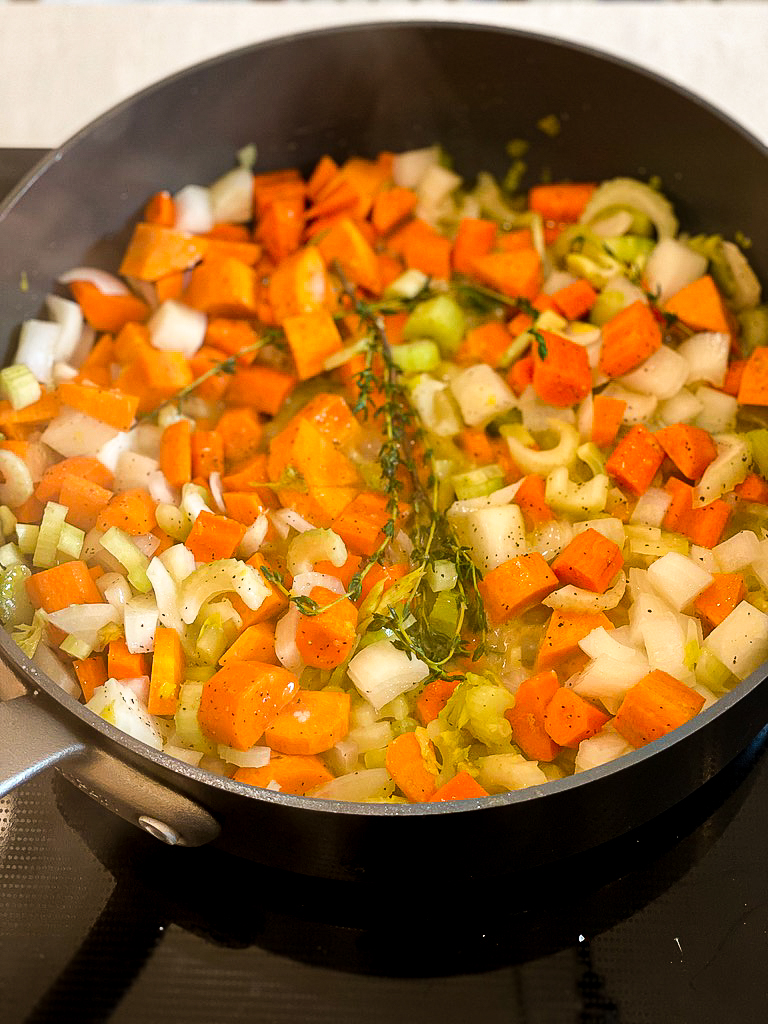 vegetables and thyme for the chicken pot pie filling
