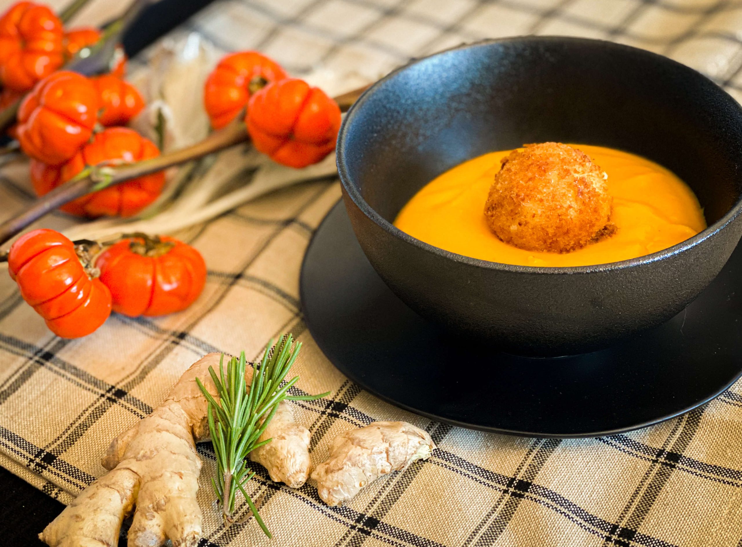 roasted butternut squash soup with goat cheese nugget plated