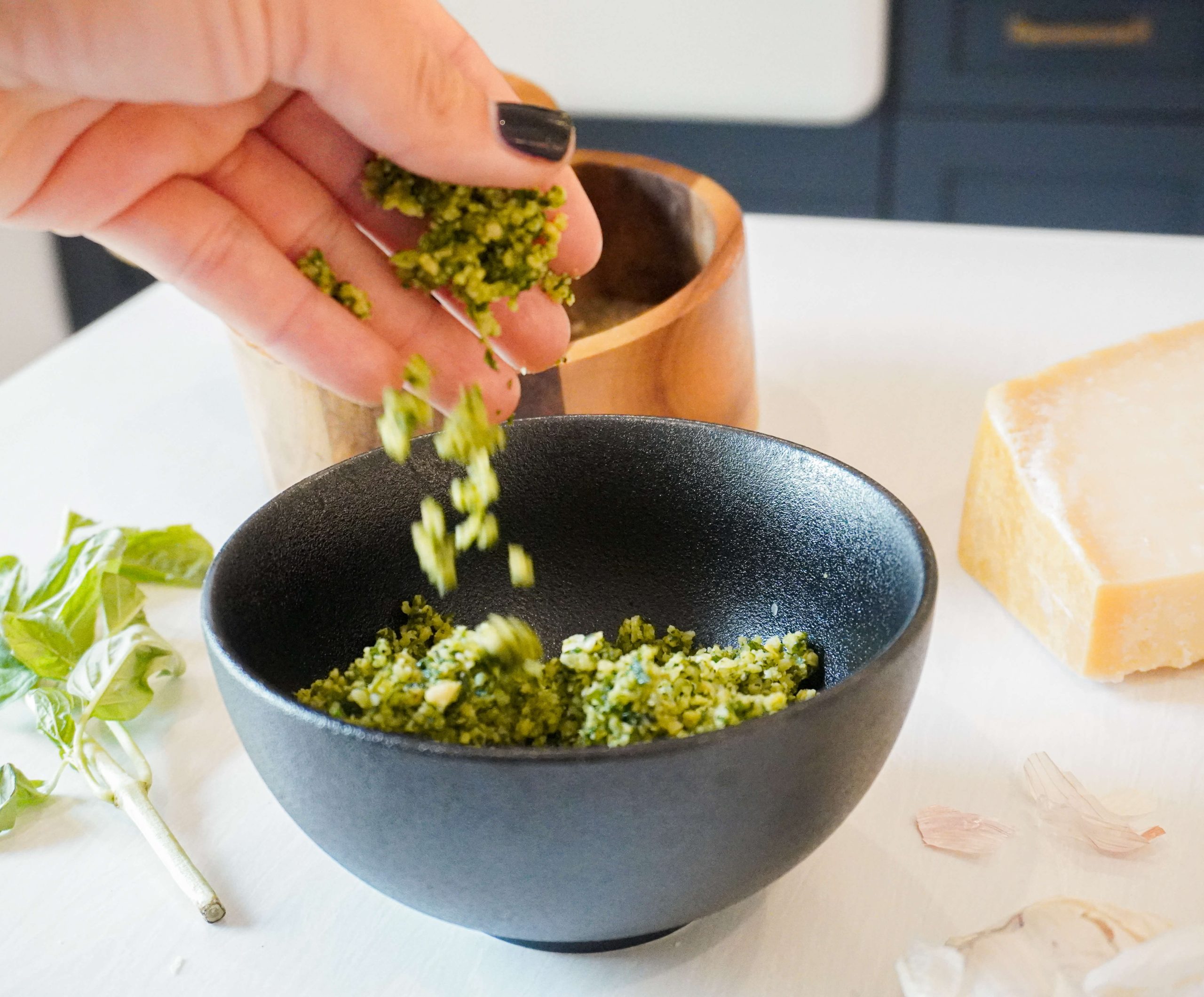 dry pesto being shown in hands