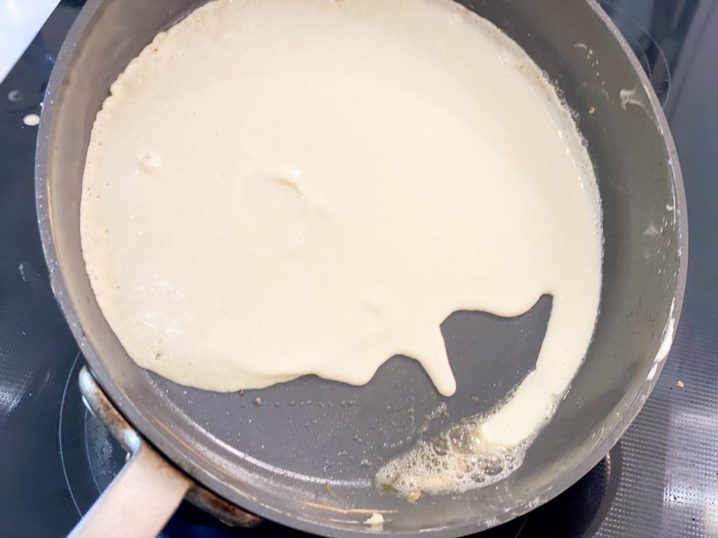 Batter swirl in the pan to cover surface for crepe 
