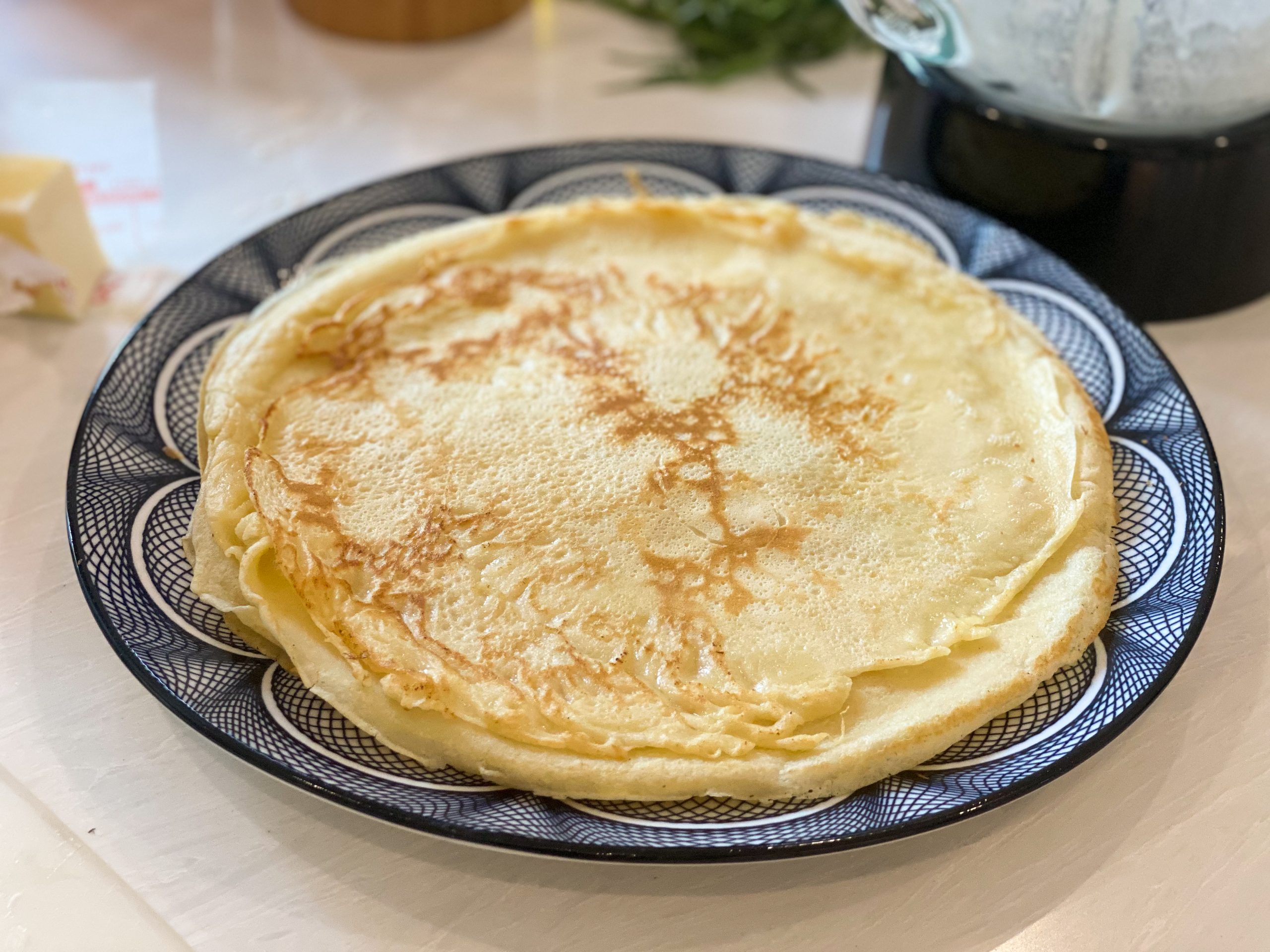 crepes resting on plate