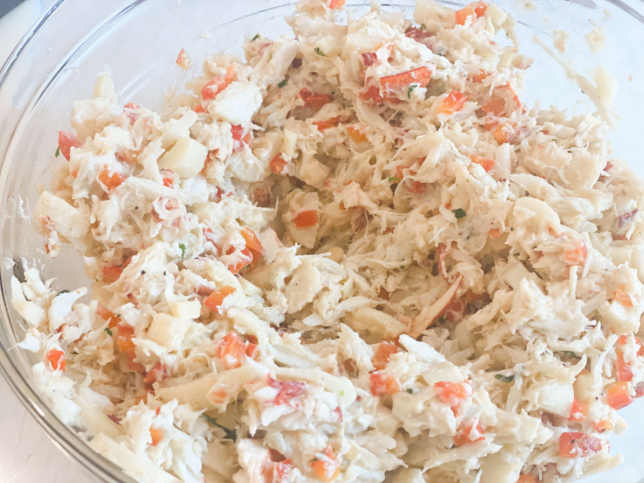 crab and lobster mixture with cream sauce incorporated 