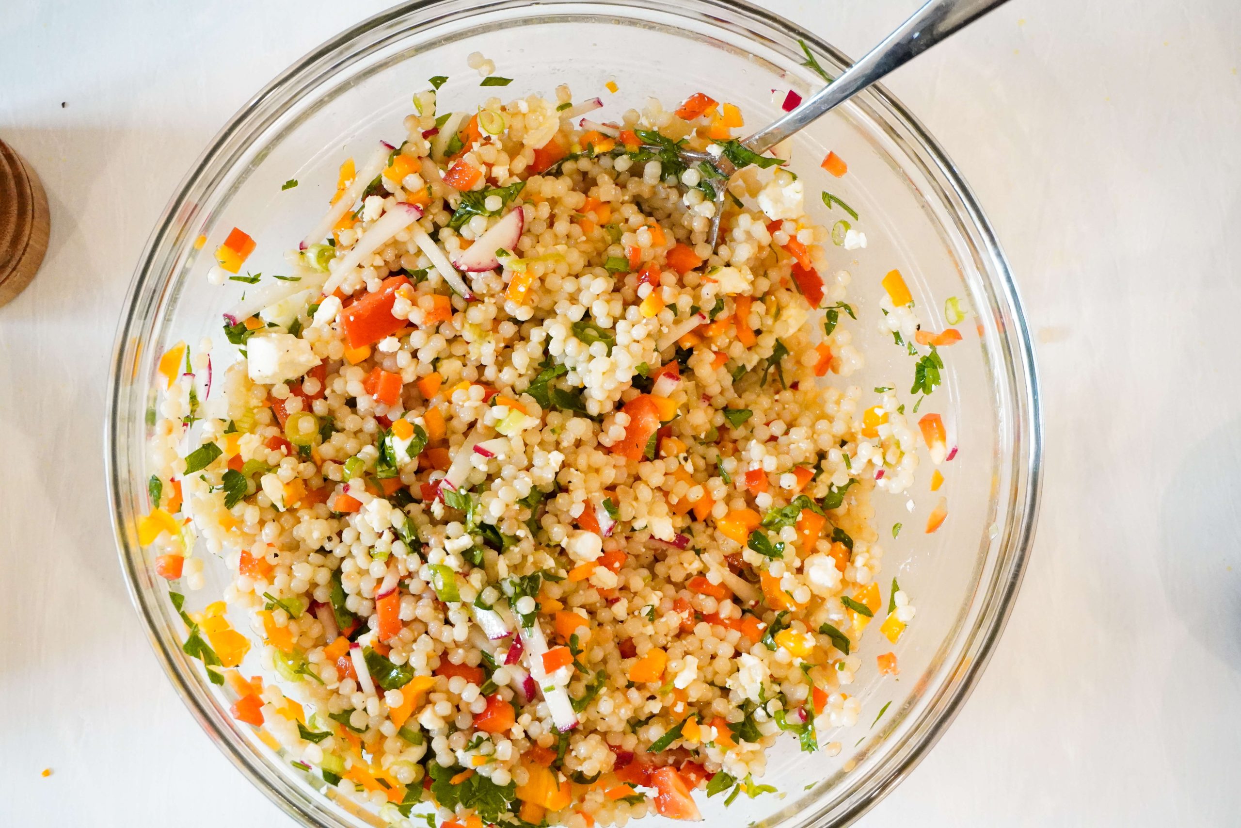 Couscous salad mixed with all the vegetables and vinaigrette