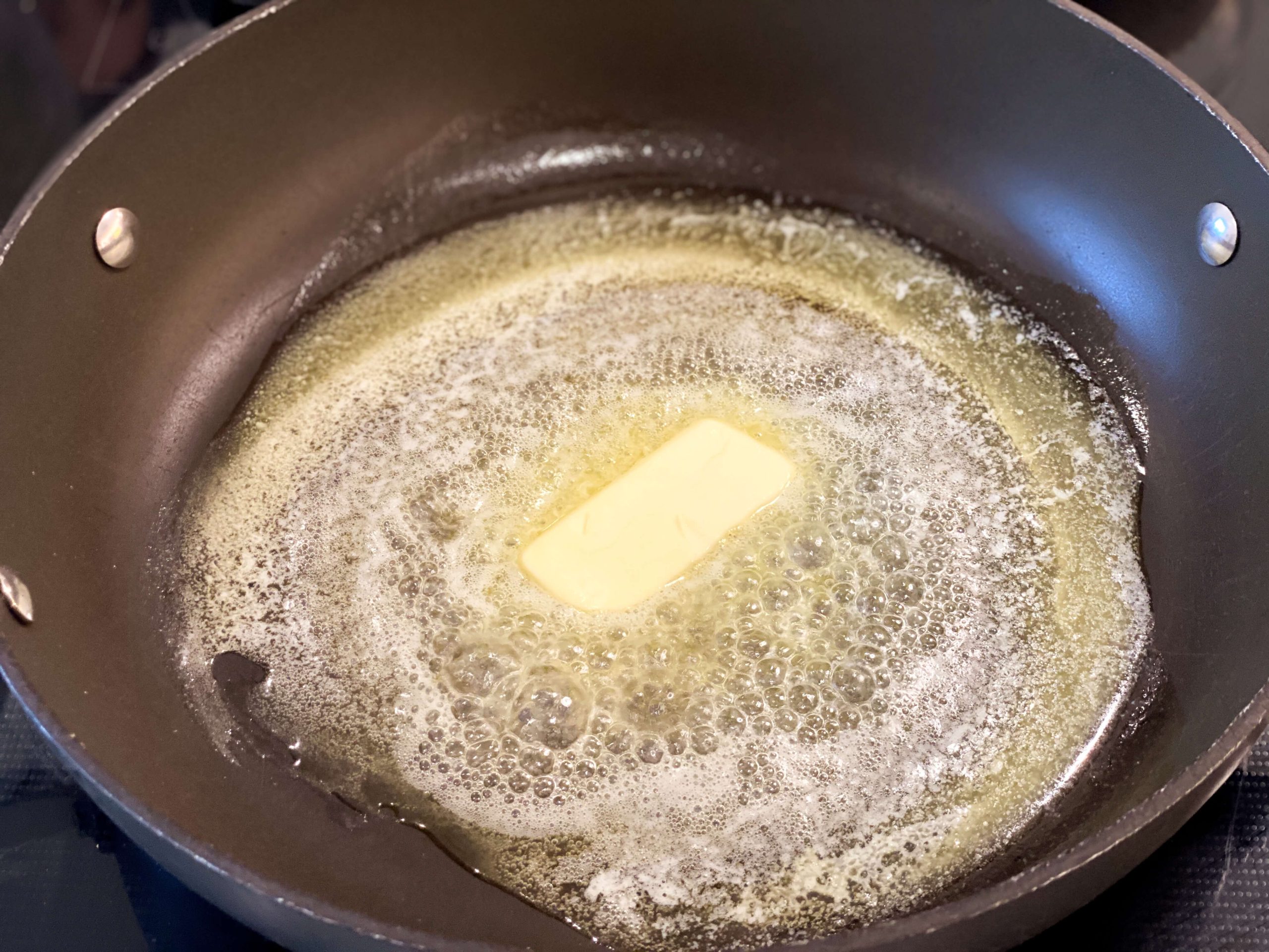 butter melting in a large pan