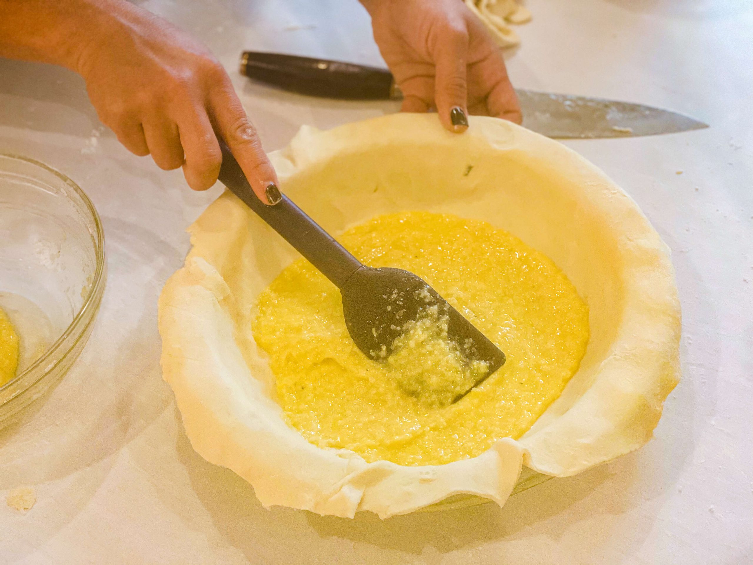 coconut filling poured on top of pie dough