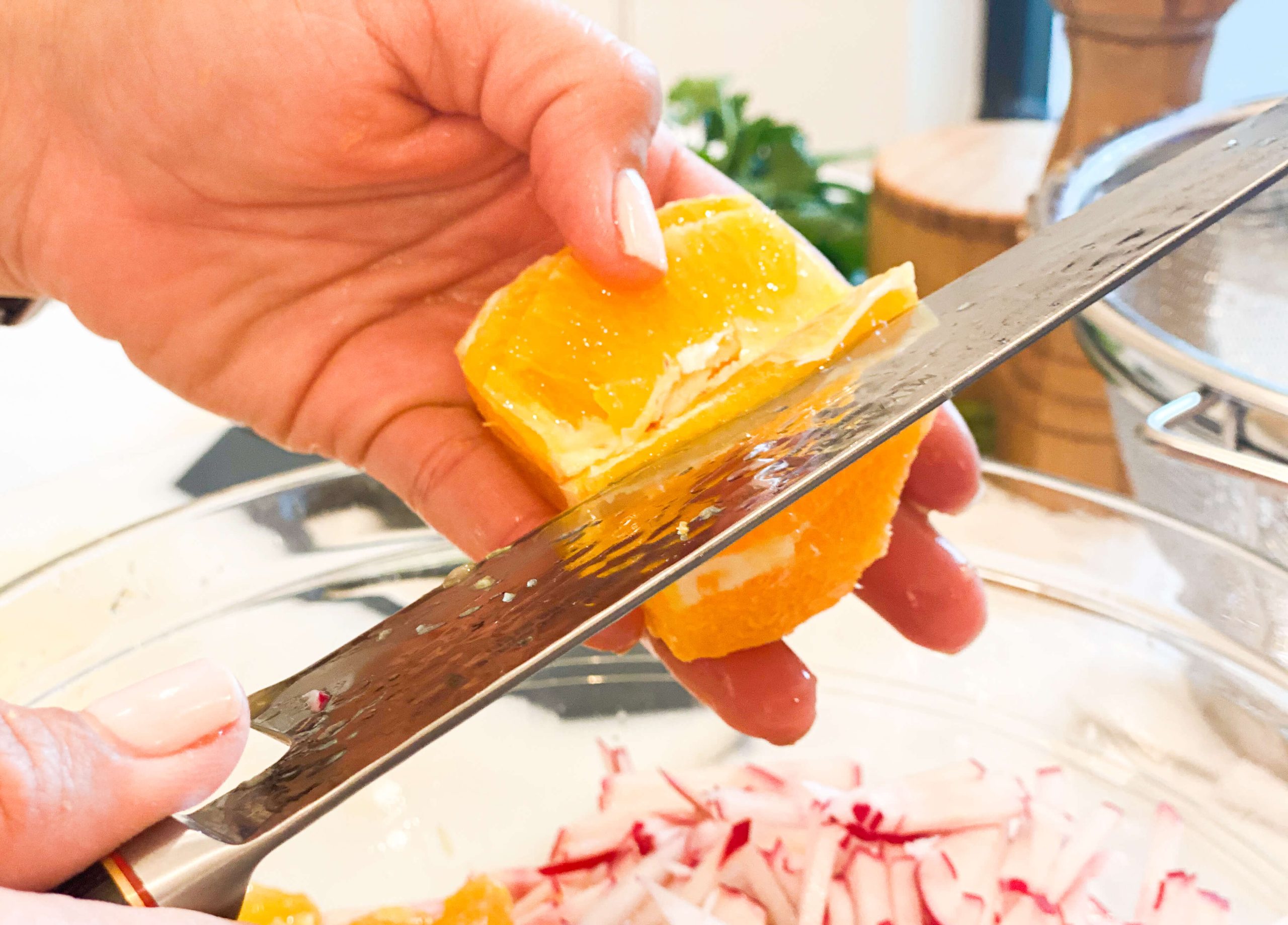 cutting orange into segments