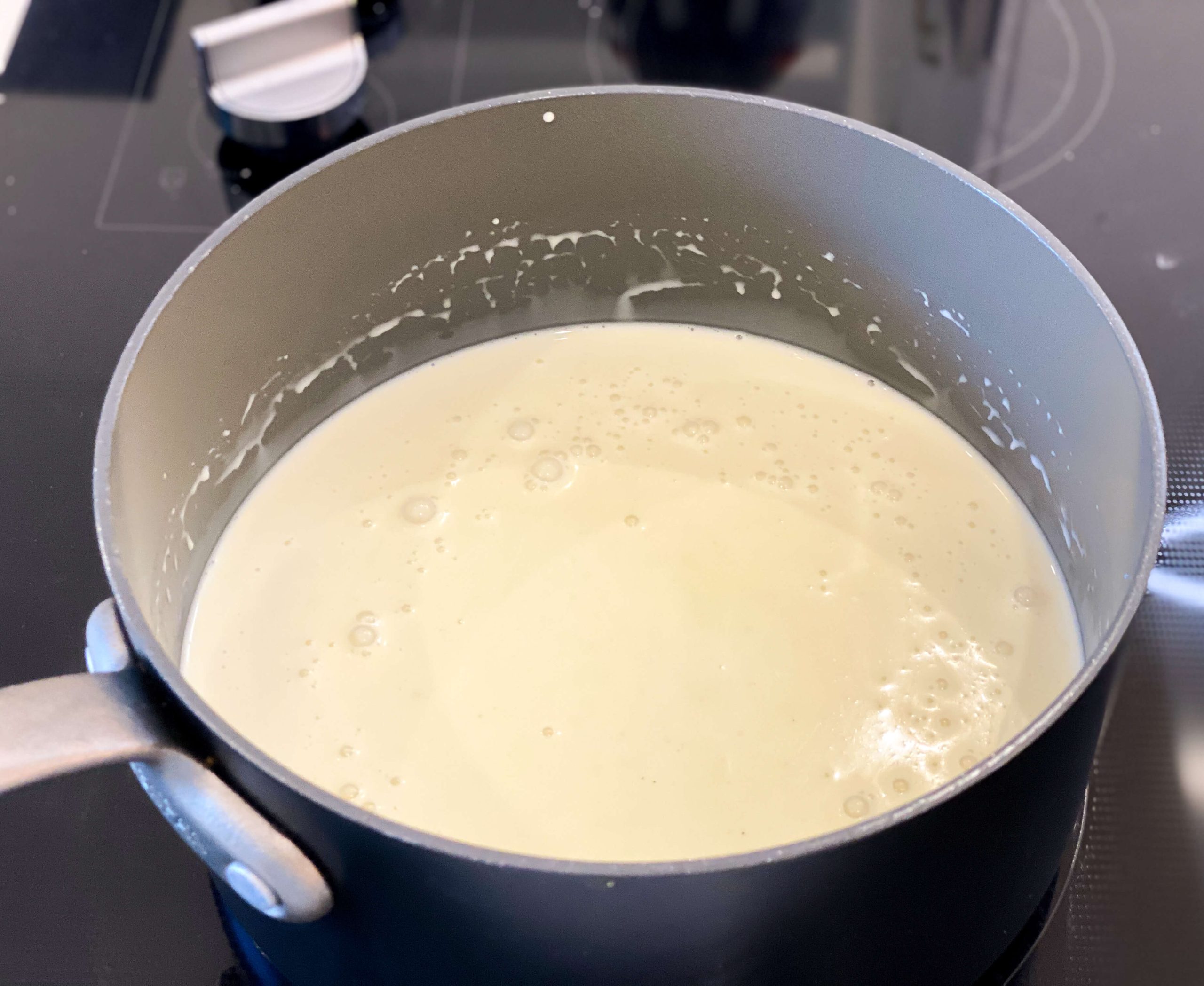 heavy cream, sugar and vanilla in a saucepan 