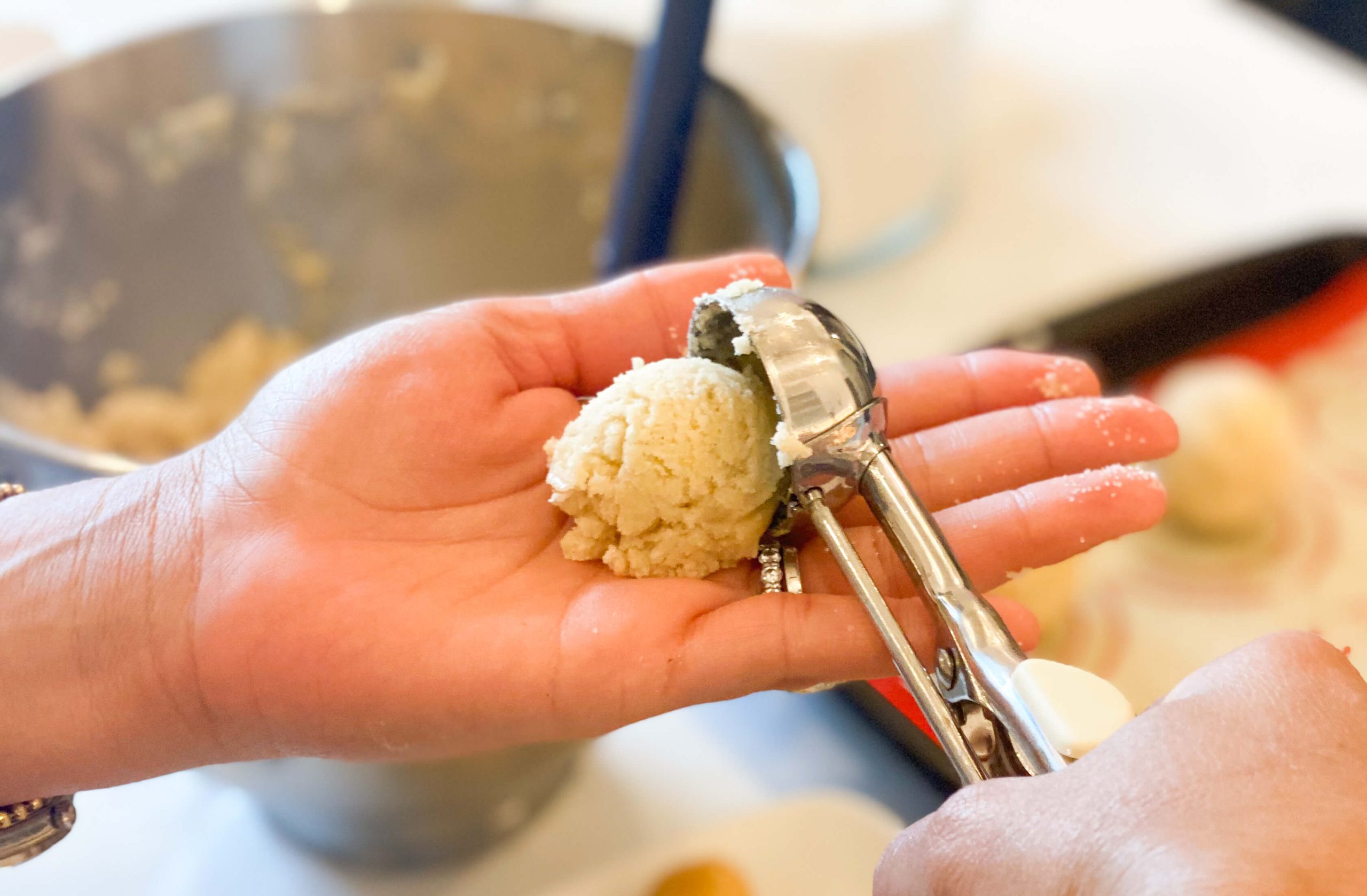 cookie dough scoop in hand