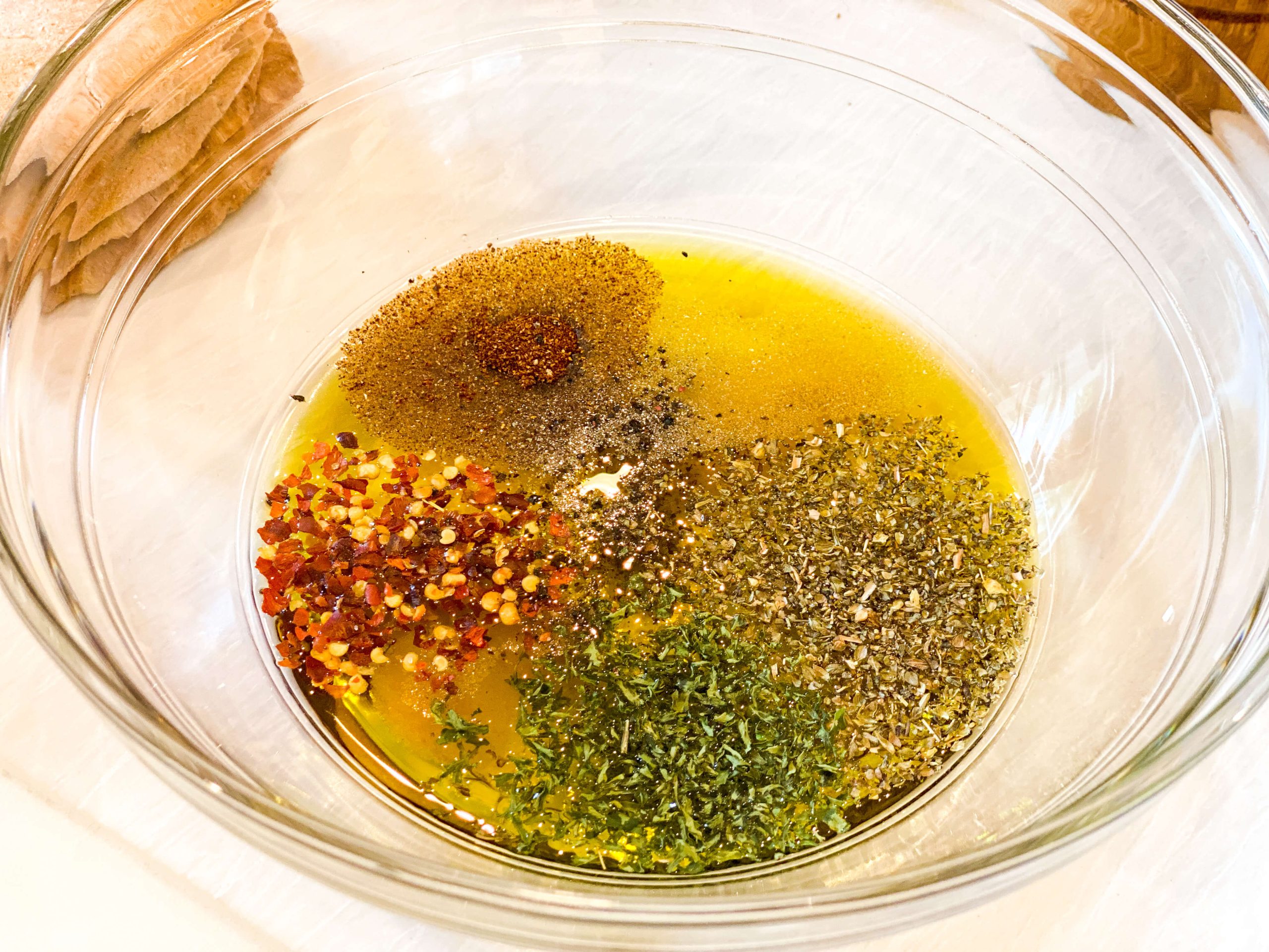olive oil mixture with herbs and spices