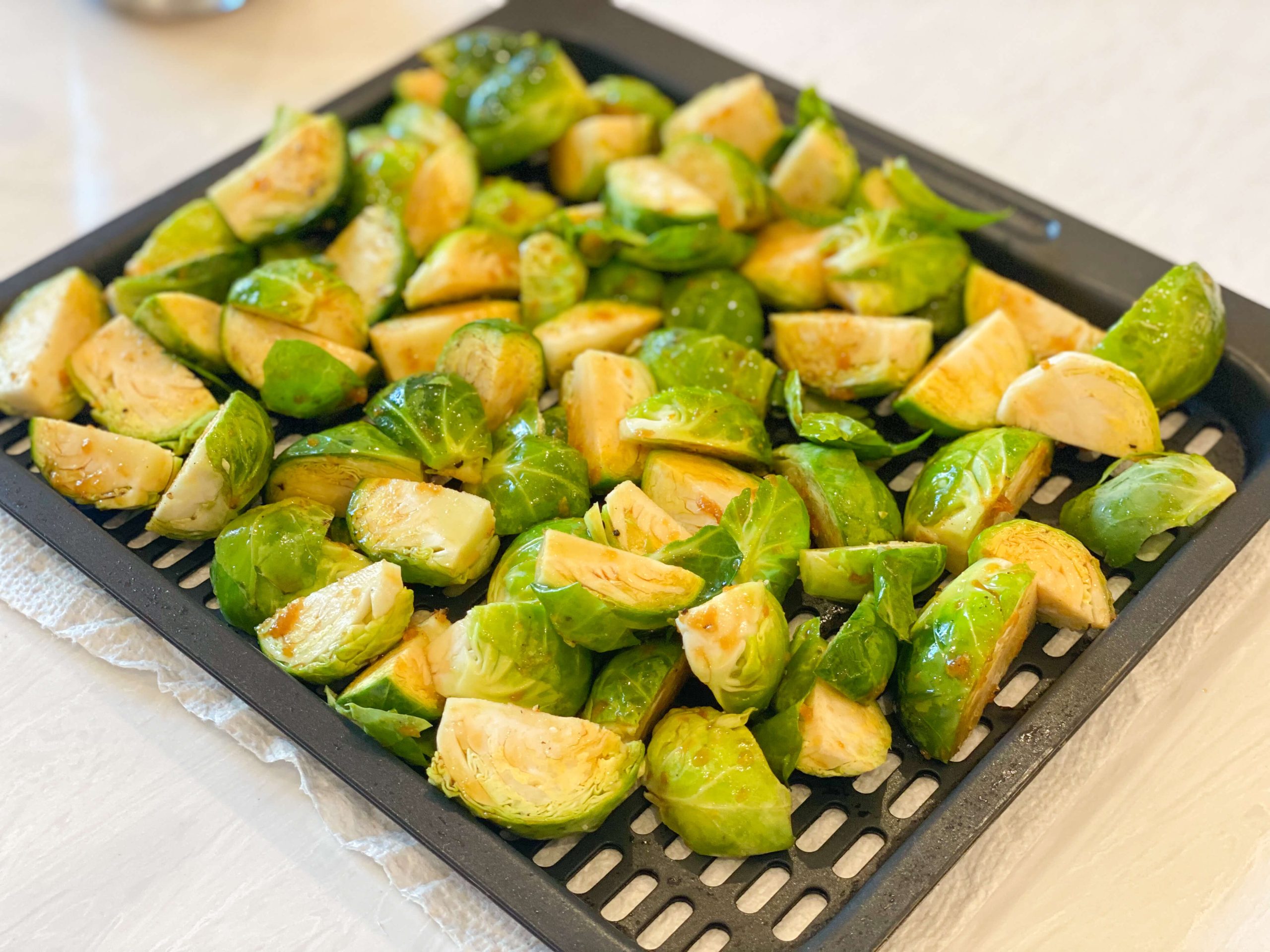 brussel sprouts on tray ready to air fry