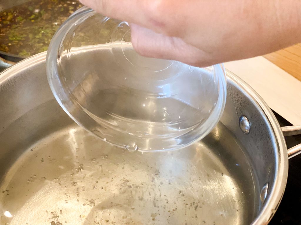 water being collected with small heat resistant bowl