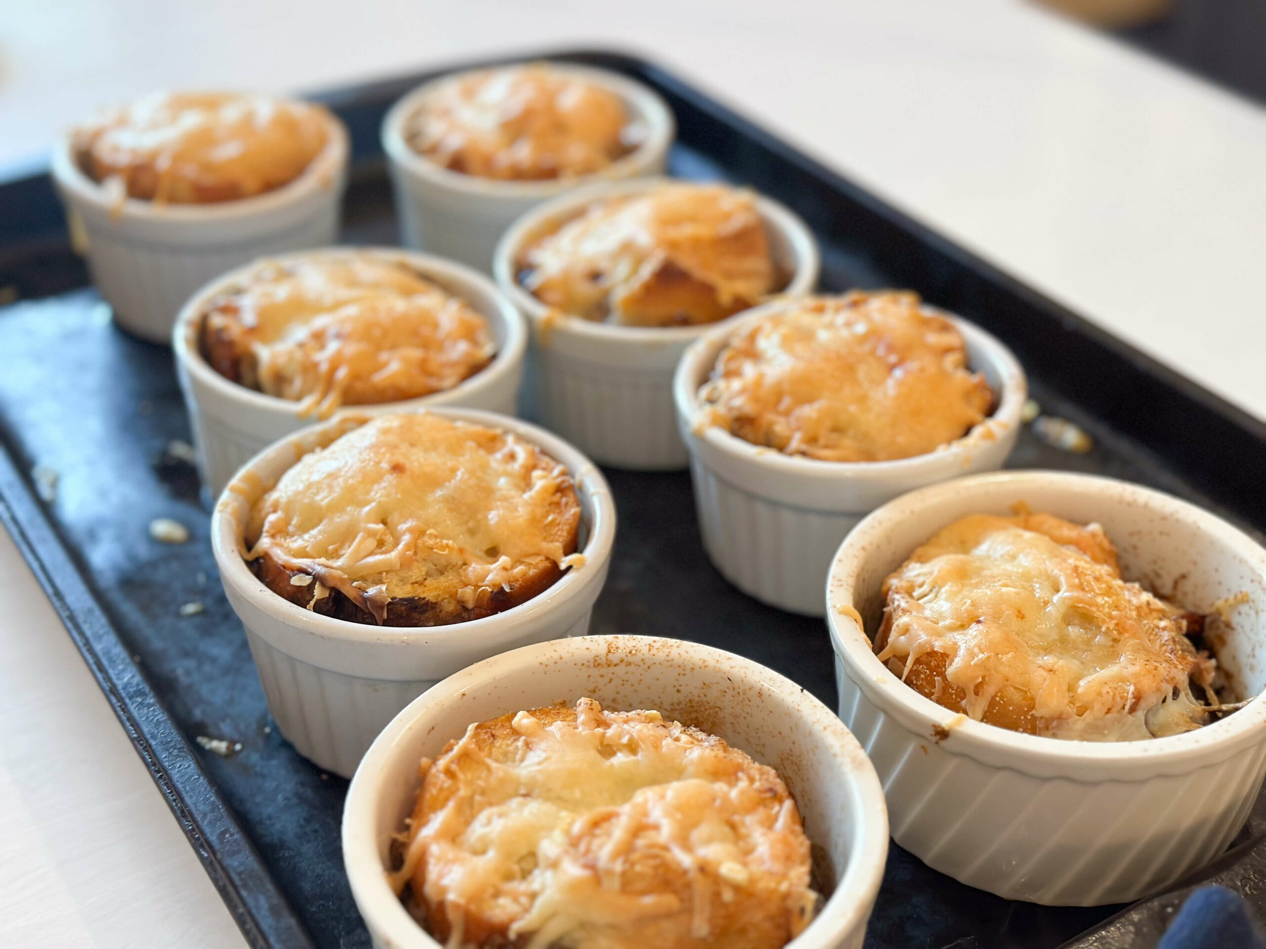 ramequins baked until cheese is melted and golden on top