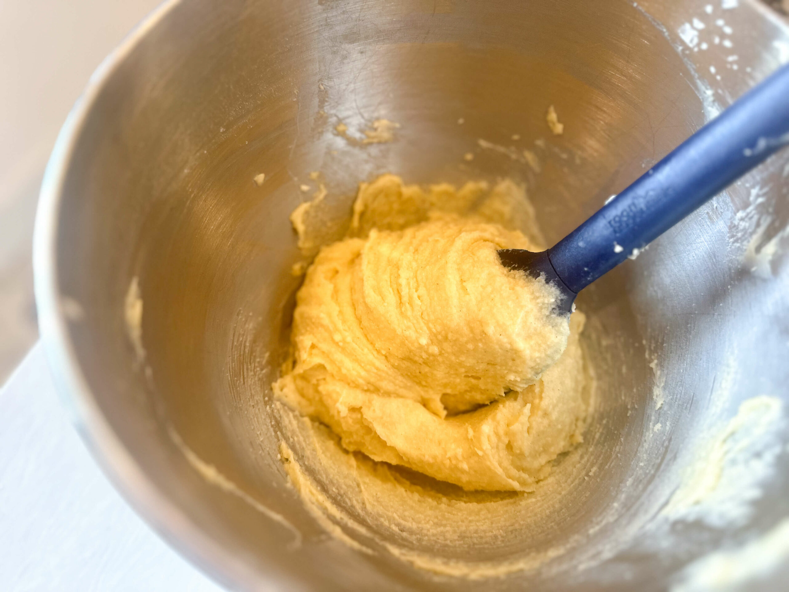 almond paste in electric mixer bowl 