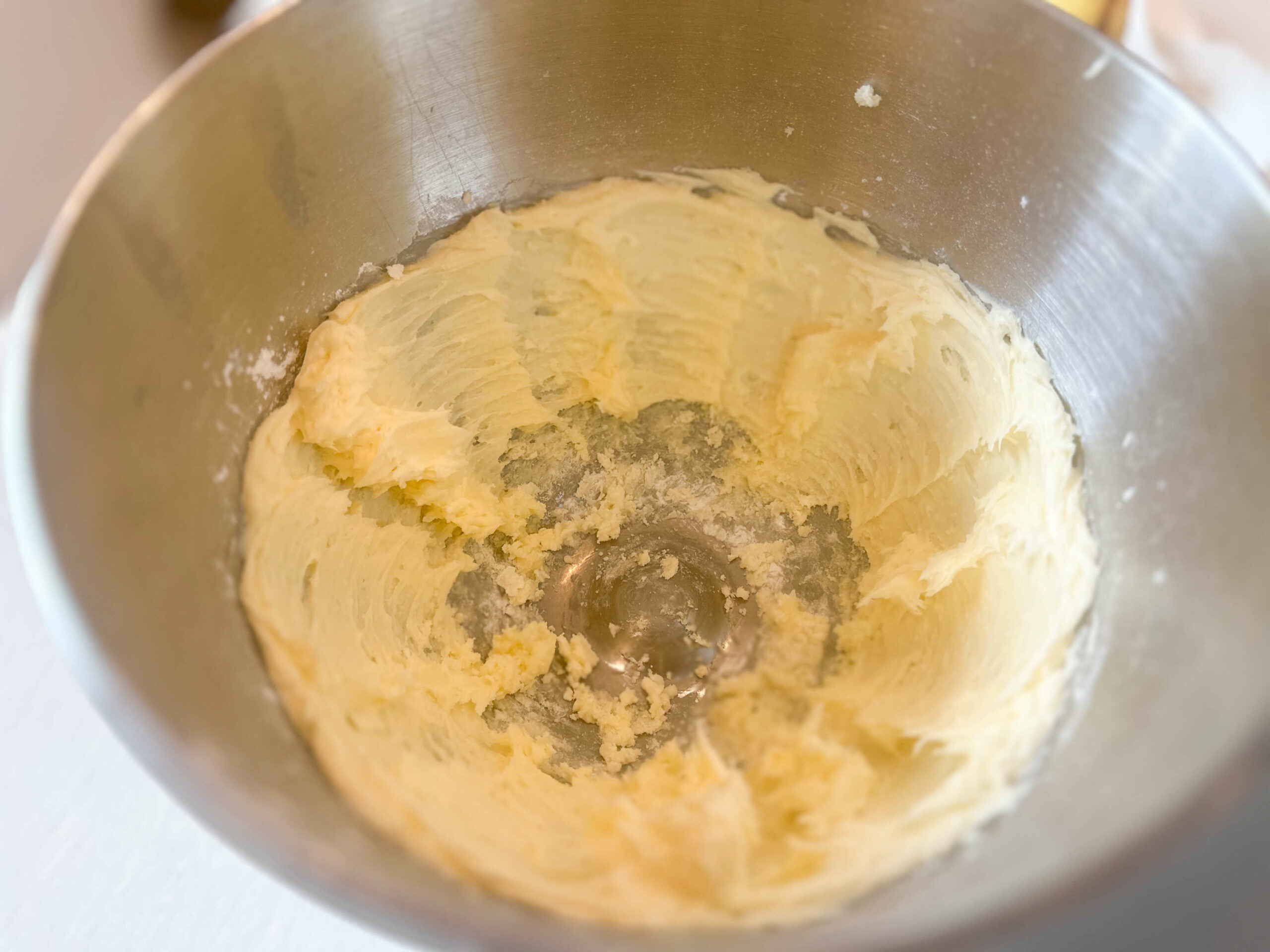 butter whipped in bowl of electric mixer