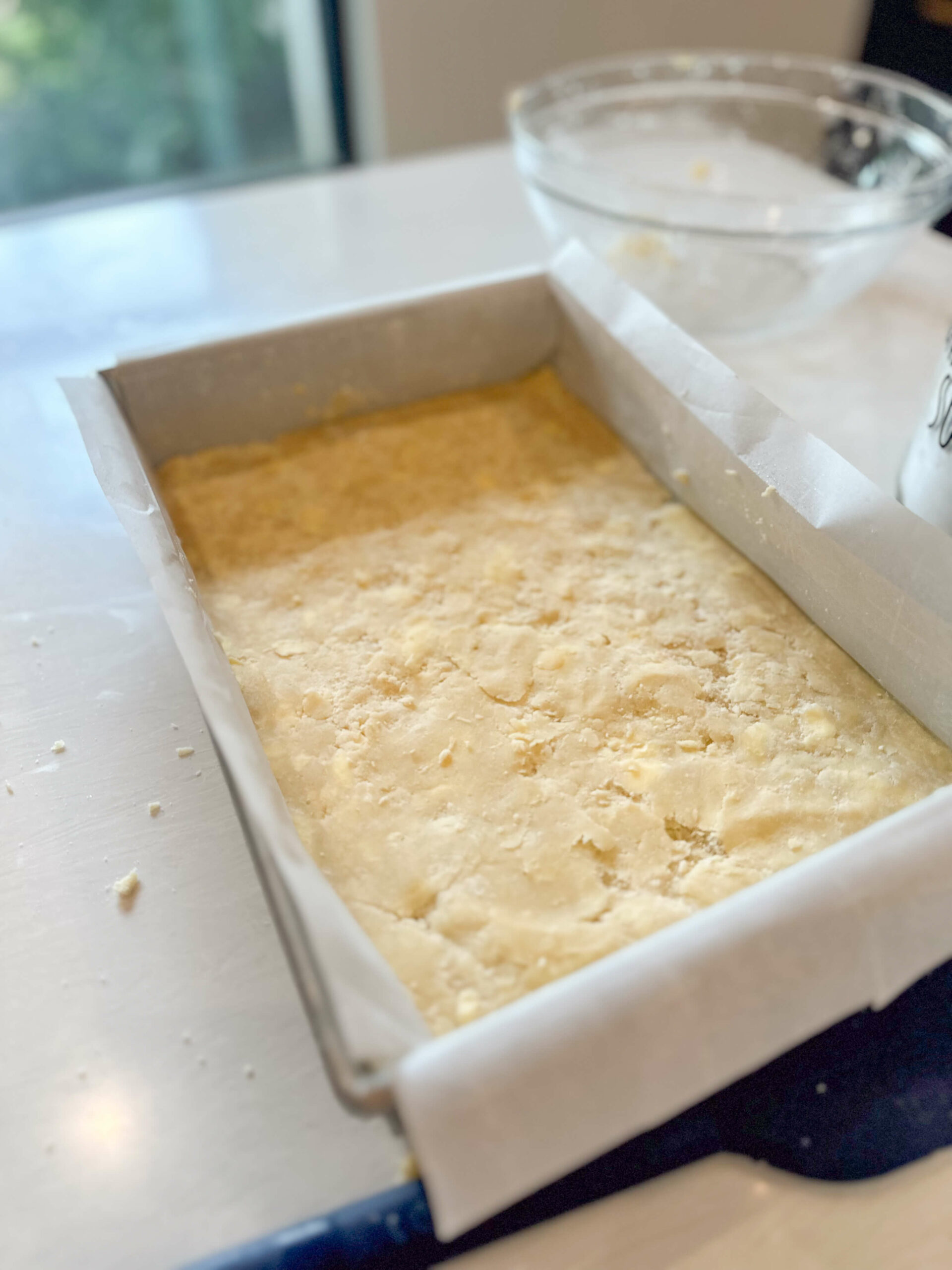 pressed shortbread in baking pan 