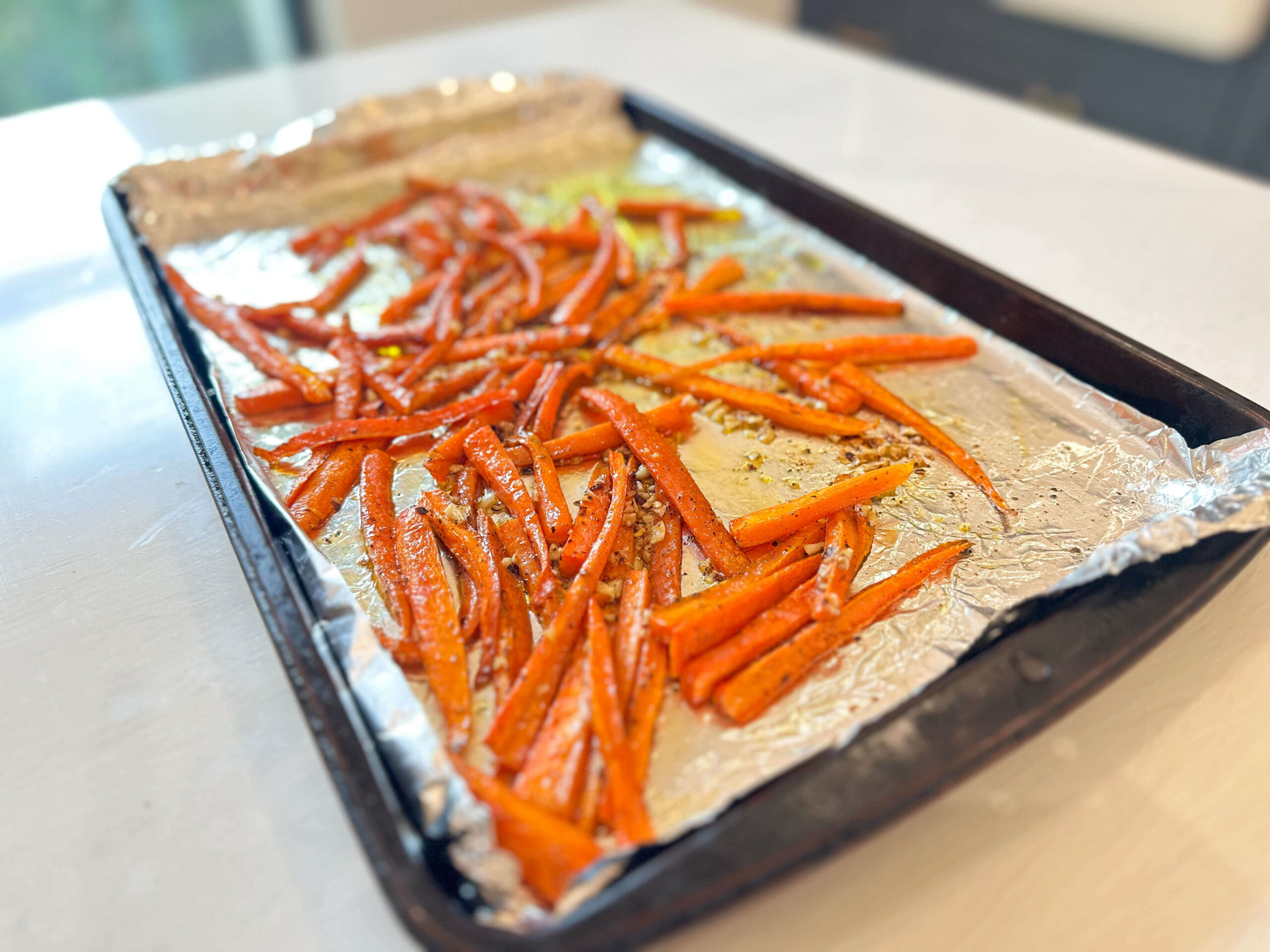 black pepper roasted carrots with garlic mixture 